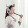 Cute Jumping Rabbit Earmuffs Hat with Moving Ears – Plush Airbag Toy Cap for Kids (Random Color)